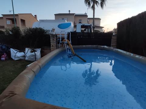 Pool filling with a tanker truck in Son Ferriol, Palma