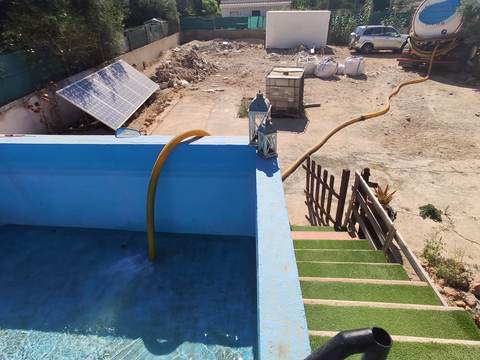 Pool filling with a tanker truck in Mallorca