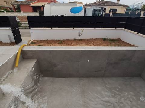 Pool filling with a tanker truck in Son Ferriol, Palma