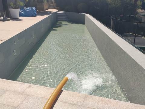 Pool filling with a tanker truck in Cas Català, Palma