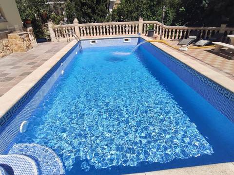 Pool filling with a tanker truck in Magaluf, Calvià
