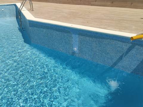 Pool filling with a tanker truck in Magaluf, Calvià